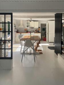 Modern Farmhouse With Thatched Roof In Rørvig