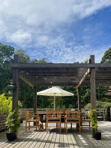 Modern Farmhouse With Thatched Roof In Rørvig