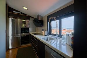 Faro de Corrubedo by Serendipia Turismo