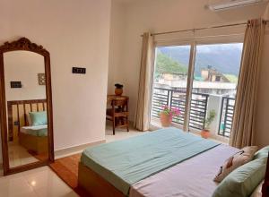 Prithvi Hotel Rishikesh - Aesthetic Quite Rooms With Smart TV, AC, WiFi and free airport pickup for 7 plus night stays in Upper Tapovan