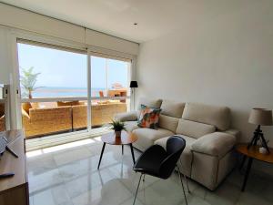 Oliveros Playa Suites, terraza exclusiva con vistas al mar
