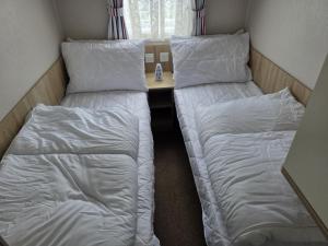 PALM GROVE THE NeW PG68 3 BEDROOM CARAVAN CHAPEL ST LEONARDS