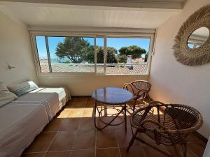 Maisons de vacances Jolie maison a 50 m de la plage : photos des chambres