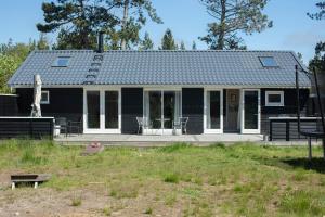 Amid Heather Near The Sea Lies Beach Hut