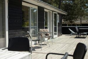 Amid Heather Near The Sea Lies Beach Hut
