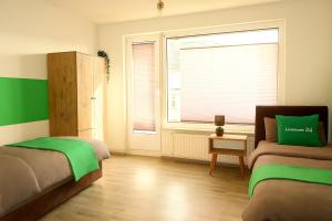 Livemore24 - Apartment 2 in Duisburg WLAN - Smart-TV - 24-7 Check-in und Küche