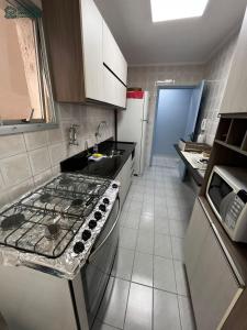 Apartamento 02 Dormitorios no Centro de Ubatuba com Ar-WIFI - 10 minutos da Orla do Cruzeiro