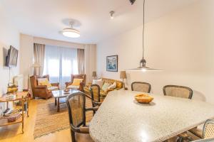 Relax Above the City-Terrace, Views & Comfort