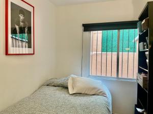 Habitación en casita de las lámparas con cama doble