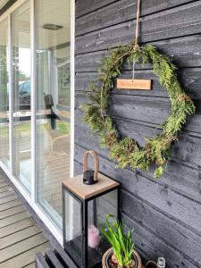 House Among Dunes And Trees In Søndervig