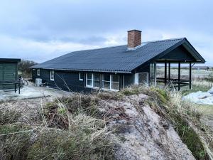 House Among Dunes And Trees In Søndervig