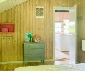 Black Wooden Cottage Near Forest And Beach