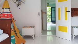 Colour Joy In Thatched House Of The North Coast