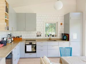 Modern Glass House With A View Over Lake Lejondal