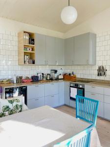 Modern Glass House With A View Over Lake Lejondal