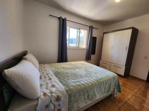 Casa Aconchego, espaçosa e bem localizada