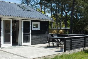 Amid Heather Near The Sea Lies Beach Hut