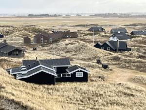 Bright House In Dune Row Near The North Sea