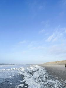 Bright House In Dune Row Near The North Sea
