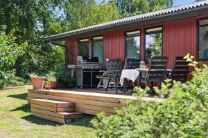 The Red Summer House With The Lush Garden At Asnæs