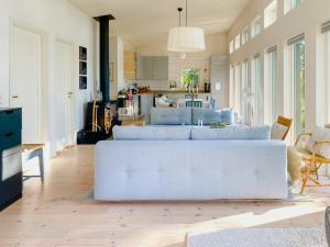 Modern Glass House With A View Over Lake Lejondal