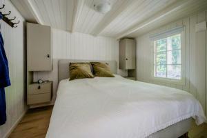 Quaint Barn Nestled Between Sea And Forest