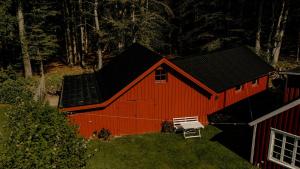 Quaint Barn Nestled Between Sea And Forest