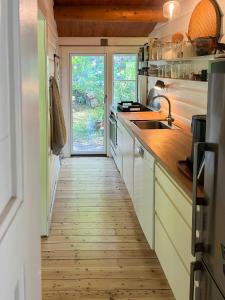 Idyllic Log Cabin Close To Forest And Kattegat