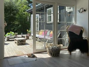 Home With Recycled Finds Near Nature