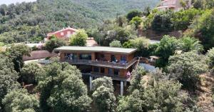 Villa lAlpana en bois vue mer a 180 degres