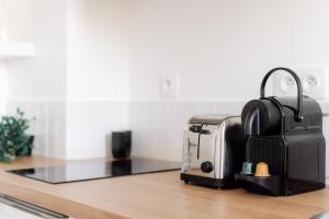 Appartements Petit Paradis proche transports : photos des chambres