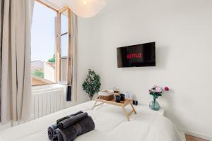 Appartements Petit Paradis proche transports : photos des chambres