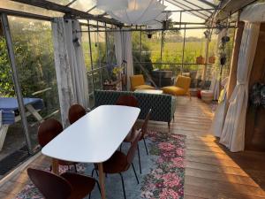 Vrijstaande accommodatie Glamping de Kas InN
