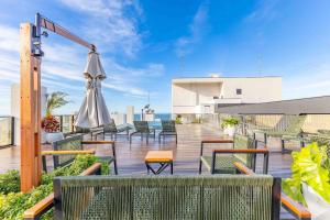 Elegância e Conforto em Suíte a 120 metros da praia de Bombinhas