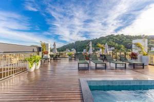 Elegância e Conforto em Suíte a 120 metros da praia de Bombinhas