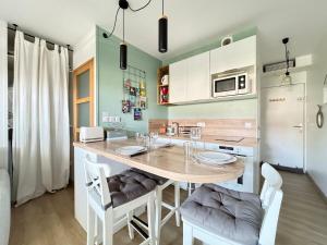 Appartements Les Muleaux - Wifi, TV, Piscine de residence : photos des chambres