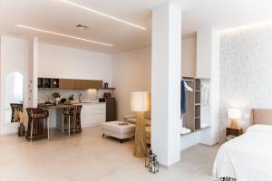 Acquamarina Suites by MONHOLIDAY