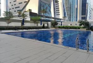 Stylish 1br Merano Tower Pool Parking