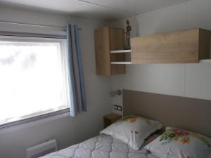 Campings Mobilhome 3 chambres tout confort, proche de la plage : photos des chambres