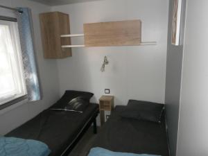 Campings Mobilhome 3 chambres tout confort, proche de la plage : photos des chambres