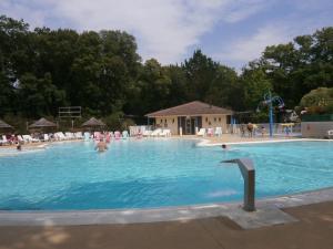 Campings Mobilhome 3 chambres tout confort, proche de la plage : photos des chambres