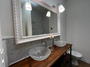 Appartements La Villa Louana charme de l'ancien en coeur de ville : photos des chambres