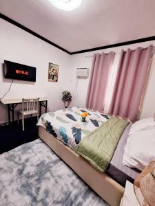 EA4 Furnished Transient Room Apartment House Walking Distance to SM Ecoland & Davao Coastal Road and Near Ecoland Bus Terminal