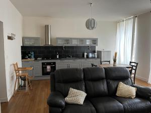 Appartements La Villa Louana charme de l'ancien en coeur de ville : photos des chambres