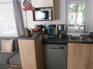 Campings Mobilhome 3 chambres tout confort, proche de la plage : photos des chambres