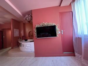 Appartements LE LOVE-ROOM, Jacuzzi, Hyper-centre : photos des chambres