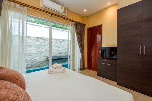 The Ville Jomtien- 3 Bedrooms Deluxe Pool Villa