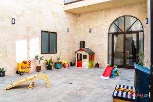 Stylish Malta Family Retreat with Kids Room & Gym