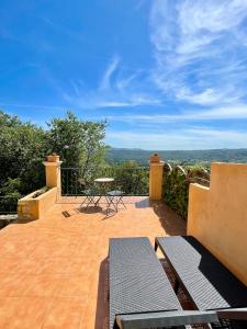 Maisons de vacances Charming little house with garden, stunning view : photos des chambres
