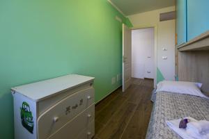 Perla sul mare con giardino